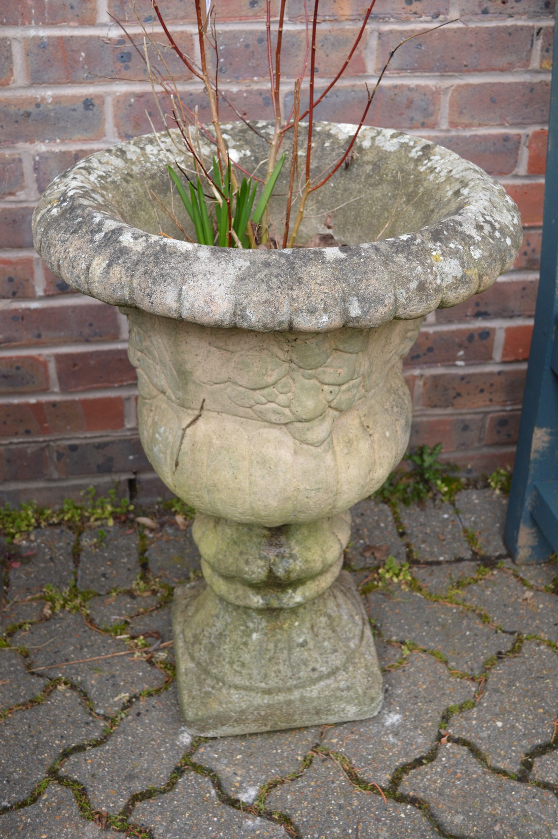 A good composite garden pedestal urn shaped planter.