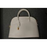 A ladies' white leather handbag.