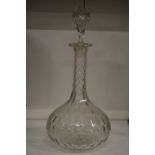 A cut glass decanter.