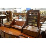 Two dressing table mirrors and a book rack.