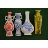 Four Chinese porcelain snuff bottles.