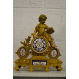 A French ormolu and porcelain mantle clock.