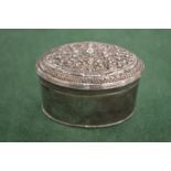 An eastern white metal snuff box.