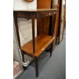 Two mahogany side tables.