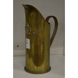 Trench art, a jug made from a shell case.