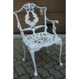A white painted cast aluminium armchair.