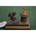 A small bronze Empire revival inkwell.