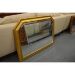 A modern gilt framed overmantle mirror.