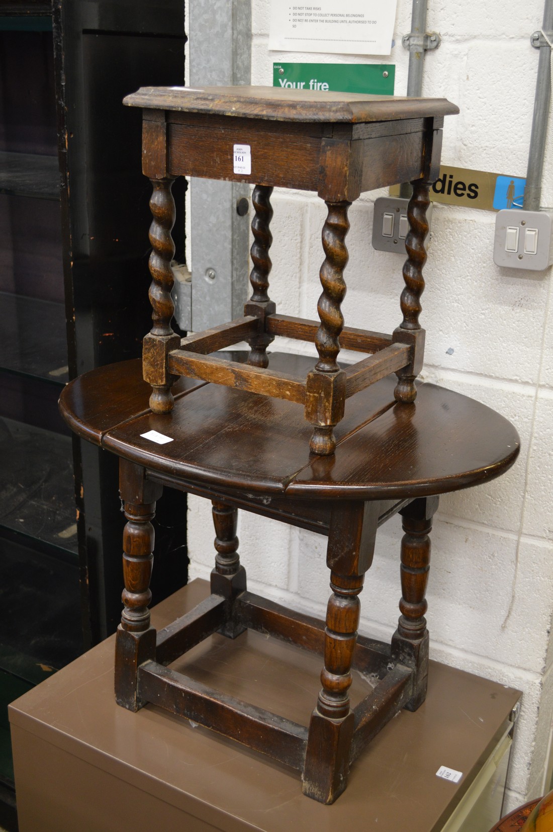 An oak stool and drop flap table.