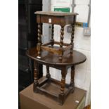 An oak stool and drop flap table.