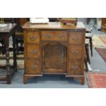 A good Georgian style small walnut kneehole pedestal desk.