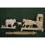 A late 19th century carved ivory items.