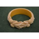 A carved bangle.