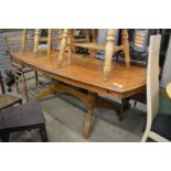 A modern pine extending kitchen table.