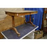 A late Victorian oak topped two drawer pedestal table.