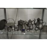 A quantity of pewter items.