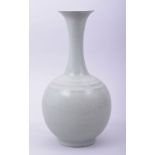 A CHINESE CELADON RU WARE BOTTLE VASE, 27cm high.