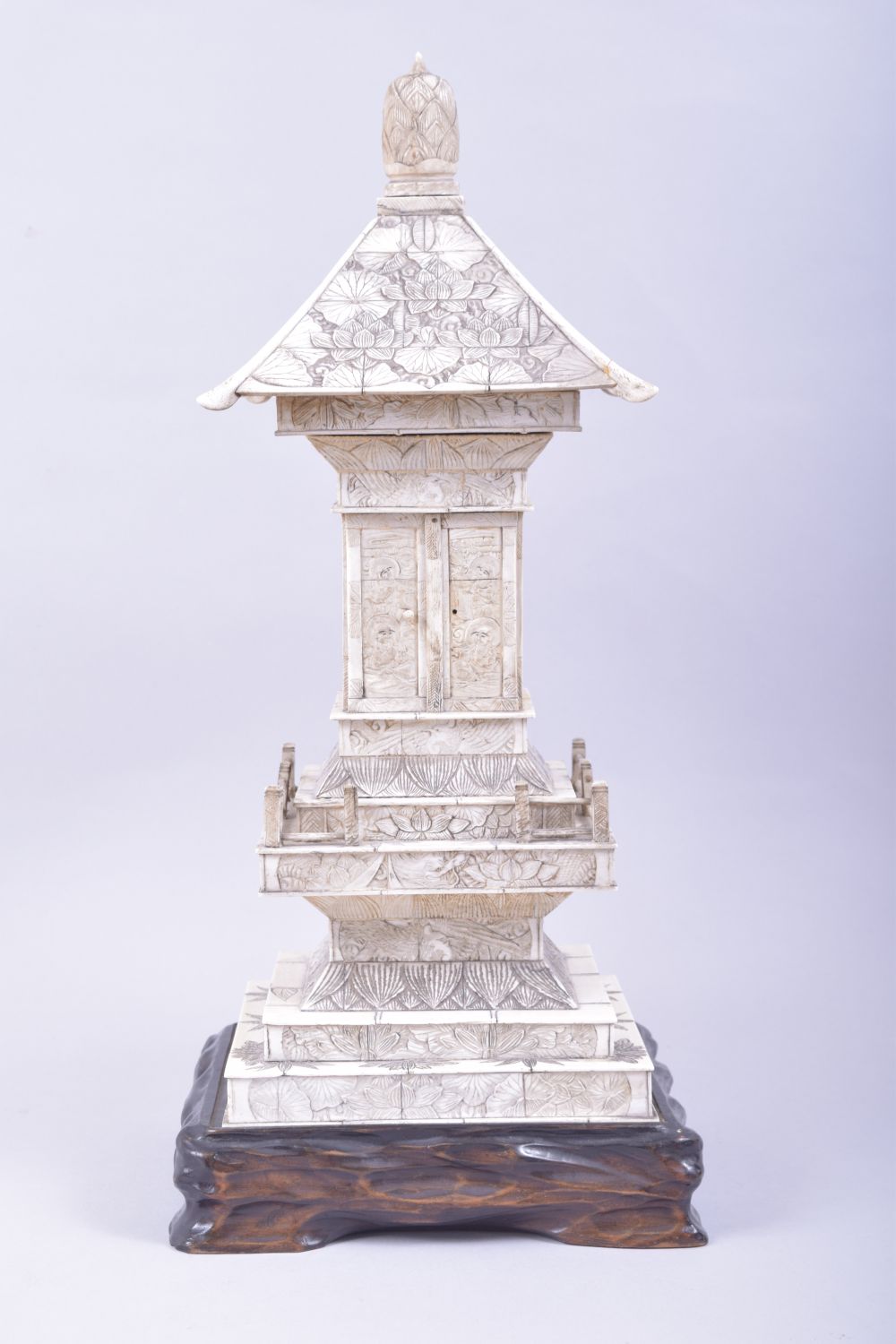 A CHINESE CARVED IVORY TEMPLE / PAGODA SHRINE, the central section with doors opening to reveal a - Image 2 of 12