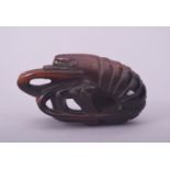 A FINE JAPANESE CARVED HORN NETSUKE OF A LOBSTER, possibly rhino horn, 6cm long.