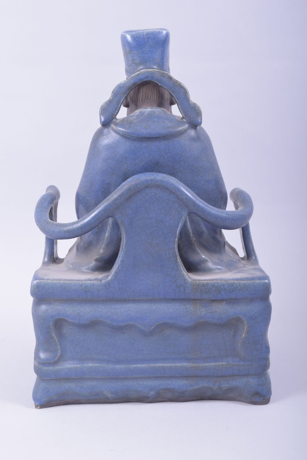 A LARGE CHINESE POWDER BLUE GLAZE POTTERY SEATED FIGURE of a god, the figure seated upon a throne - Image 3 of 8