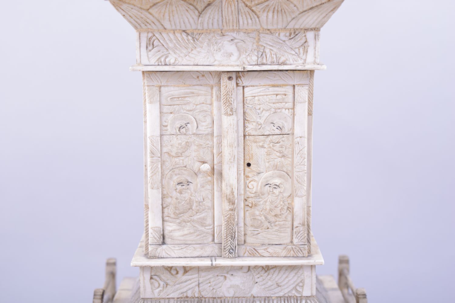 A CHINESE CARVED IVORY TEMPLE / PAGODA SHRINE, the central section with doors opening to reveal a - Image 7 of 12