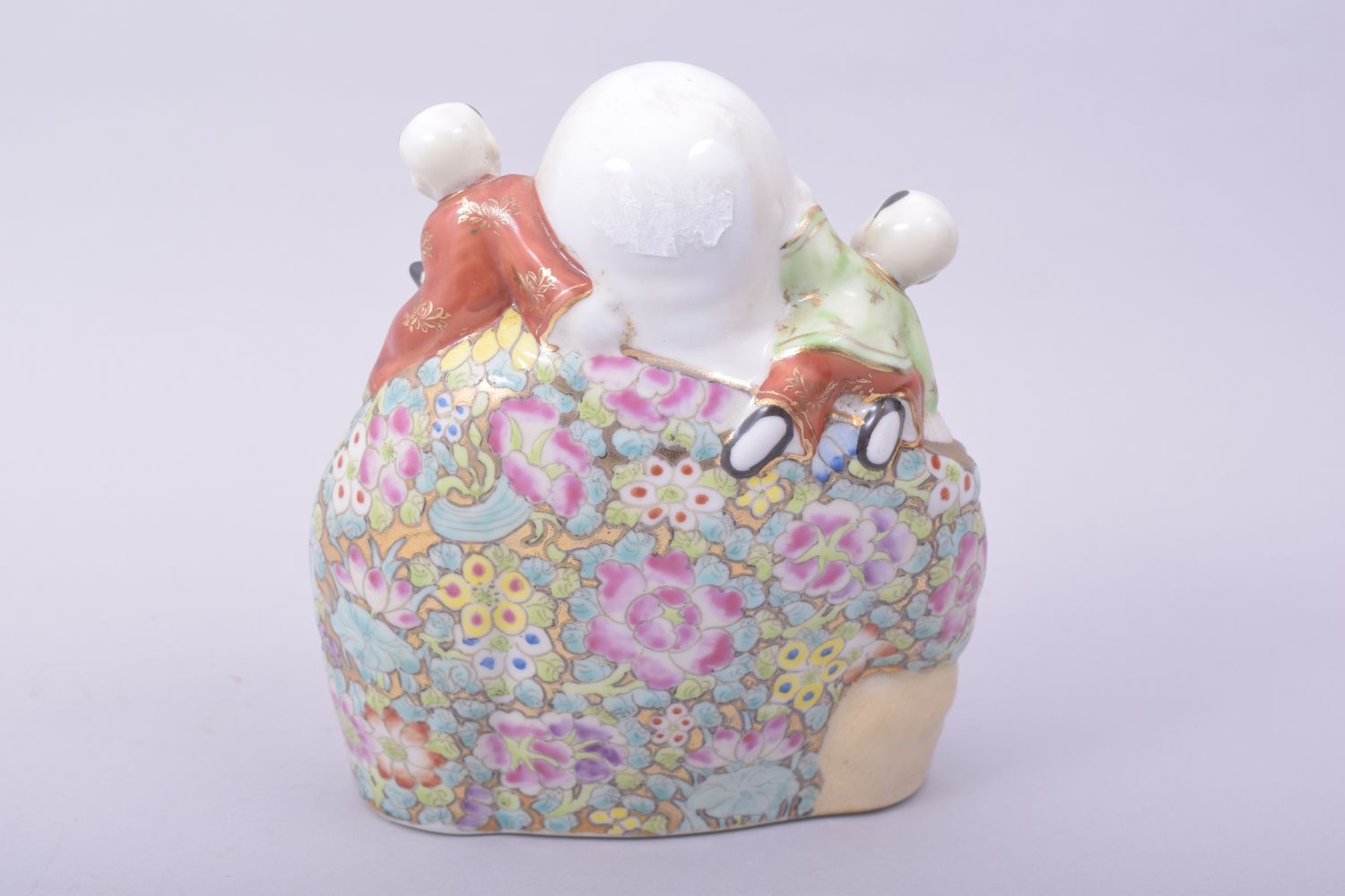 A CHINESE PORCELAIN LAUGHING BUDDHA, with five children, 15cm high. - Image 3 of 7