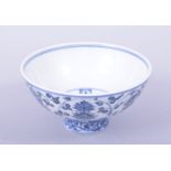 A CHINESE BLUE AND WHITE PORCELAIN BOWL, the exterior painted with lotus, the interior baring a