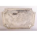 A GOOD PERSIAN ENGRAVED WHITE METAL TRAY, the centre depicting a dancer and musicians surrounded