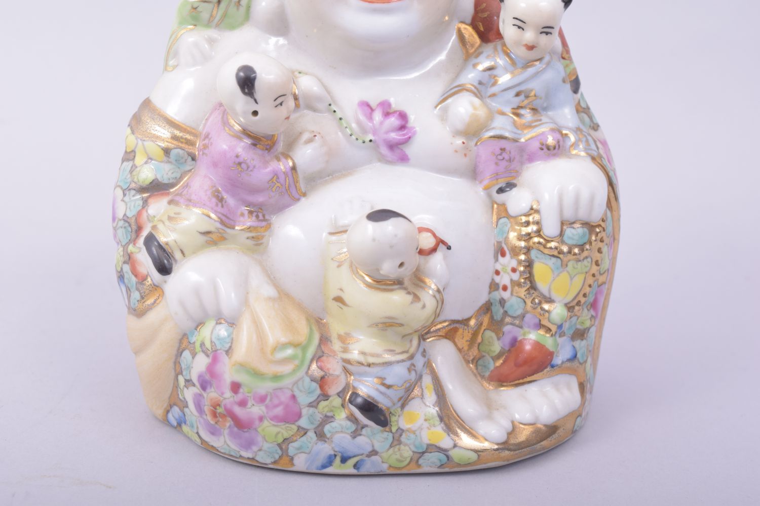 A CHINESE PORCELAIN LAUGHING BUDDHA, with five children, 15cm high. - Image 6 of 7