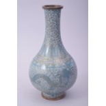 A SMALL CHINESE CLOISONNE TURQUOISE GROUND VASE, decorated with dragons and the flaming pearl of