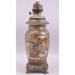 A JAPANESE SATSUMA PORCELAIN LAMP VASE with metal mounts, decorated with panels of figures,