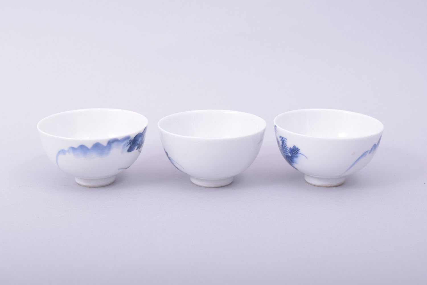 THREE CHINESE BLUE AND WHITE PORCELAIN TEA BOWLS, each painted with a landscape scene, 7.5cm - Image 3 of 6