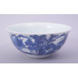 A CHINESE BLUE AND WHITE PORCELAIN BOWL, the exterior painted with a landscape scene, six