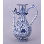A CHINESE BLUE AND WHITE PORCELAIN EWER, painted with foliate decoration, 23.5cm high.