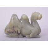 A CARVED JADE MODEL OF A CAMEL, 9cm long.