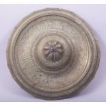 AN ISLAMIC ENGARVED CALLIGRAPHIC BRASS CIRCULAR BASE, 26cm diameter.