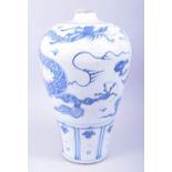 A LARGE CHINESE BLUE AND WHITE YUAN STYLE MEIPING VASE, the body painted with a dragon amongst