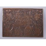 A FINE PERSIAN QAJAR CARVED WOODEN PANEL, depicting kings and flora, 24.5cm x 34.5cm.