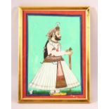 AN INDIAN MINIATURE PAINTING OF A NOBLEMAN - stood in his attire holding his stick - framed