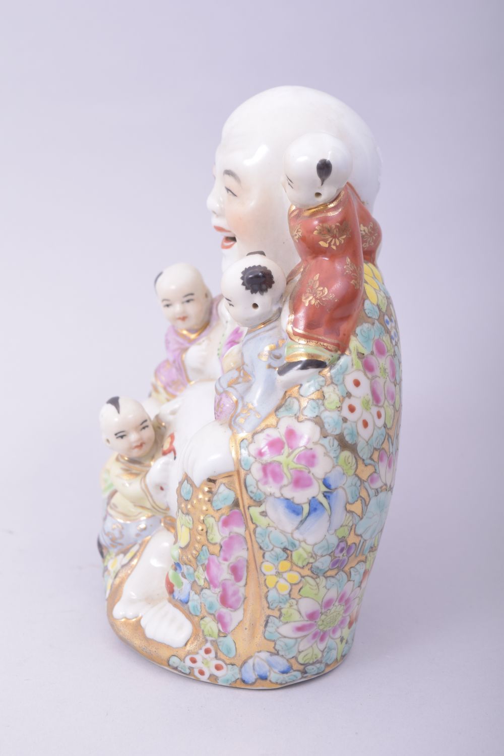 A CHINESE PORCELAIN LAUGHING BUDDHA, with five children, 15cm high. - Image 2 of 7