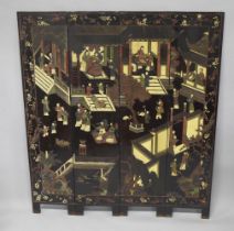 A CHINESE FOUR PANELLED LACQUERED WOODEN SCREEN, the screen with a courtyard scene with numerous