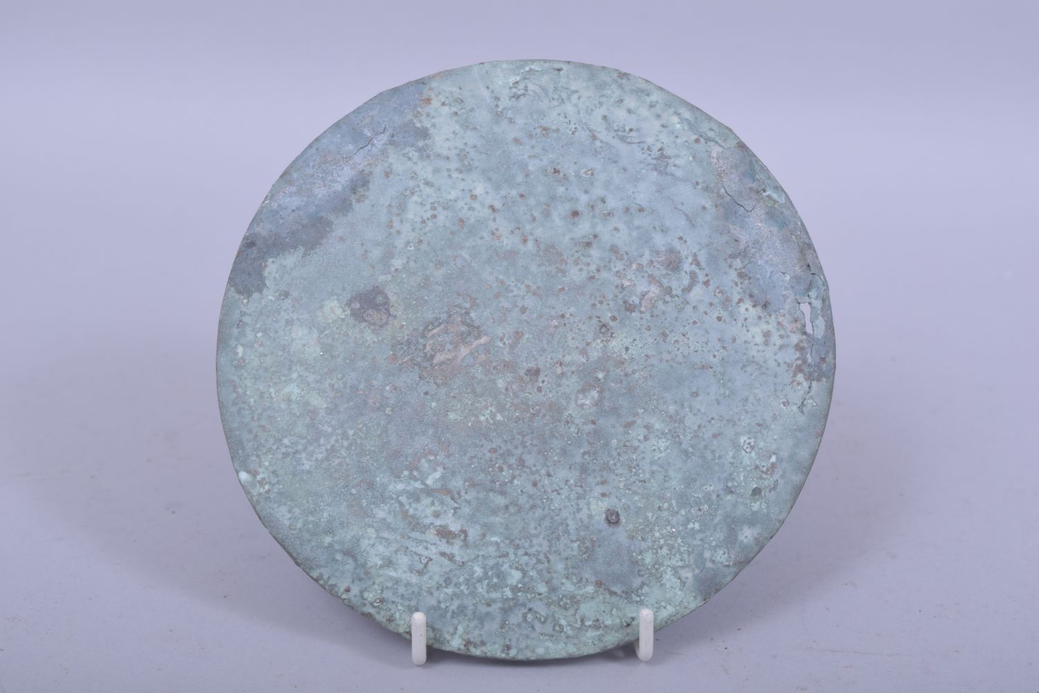 A CHINESE ARCHAIC BRONZE MIRROR, possibly tang dynasty, 15.5cm diameter. - Image 2 of 2