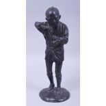 A JAPANESE MEIJI BRONZE FIGURE OF A FARMER HOLDING A PIPE, on a circular bronze base, 29.5cm high.