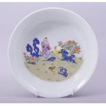 A CHINESE FAMILLE JAUNE PORCELAIN BOWL, the interior decorated with a figure and cockerel, the