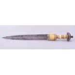 AN EARLY ISLAMIC OR AFRICAN IVORY HILTED DAGGER, 29.5cm long