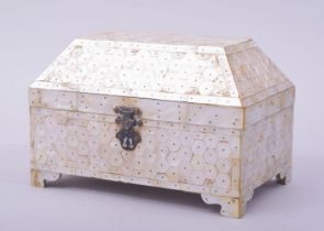 AN INDIAN GOA MOTHER OF PEARL LIDDED CASKET, the casket entirely made up of cut mother of pearl