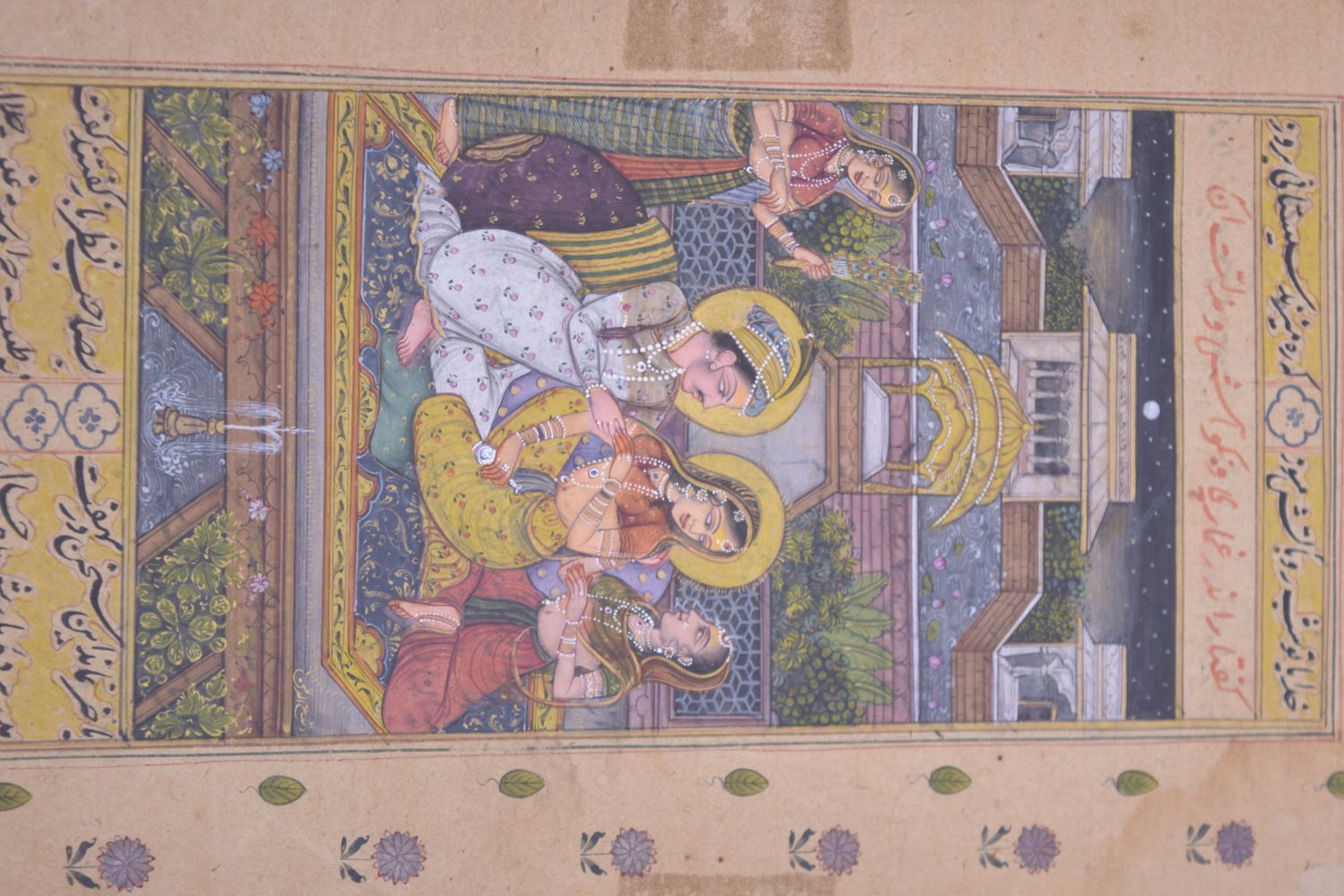 A 18TH/19TH CENTURY INDIAN MUGHAL MINIATURE, depicting a seated prince aside three females in a - Image 3 of 6