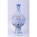 A LARGE CHINESE BLUE AND WHITE PEDESTAL CENSER WITH PIERCED COVER, for the Islamic market, profusely