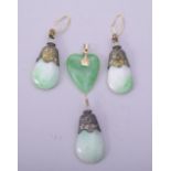 A CHINESE SET OF THREE METAL MOUNTED JADE PENDANT EARRINGS, together with another green pendant (