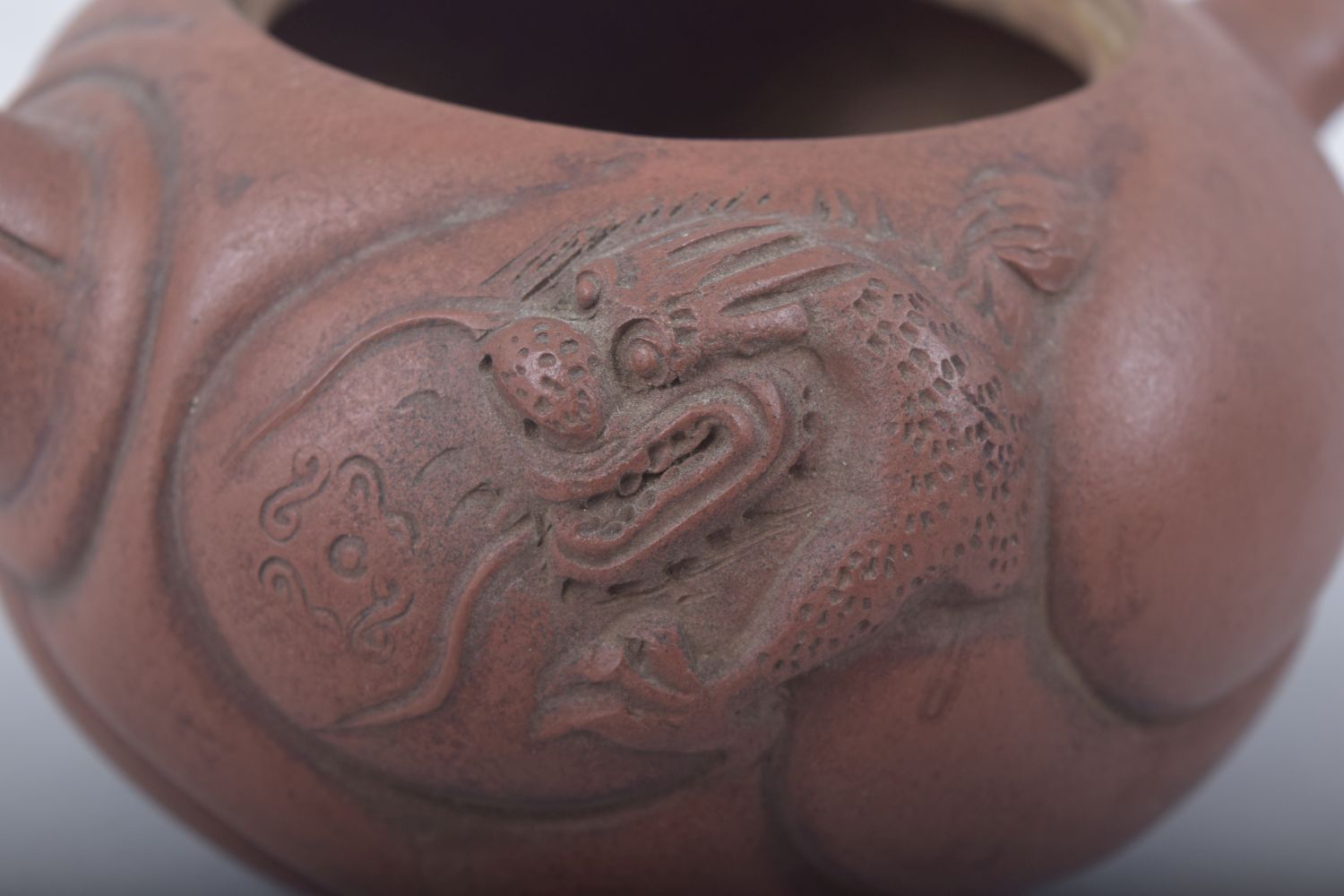 A CHINESE YIXING TEAPOT, the side with moulded dragon and carp, the cover with reticulated dragon - Image 8 of 10